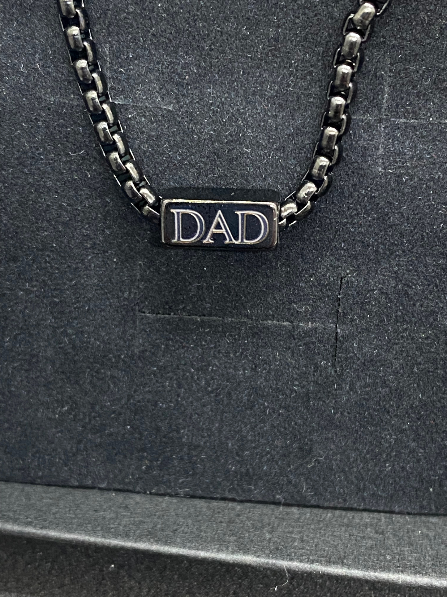 black bracelet engraved with DAD