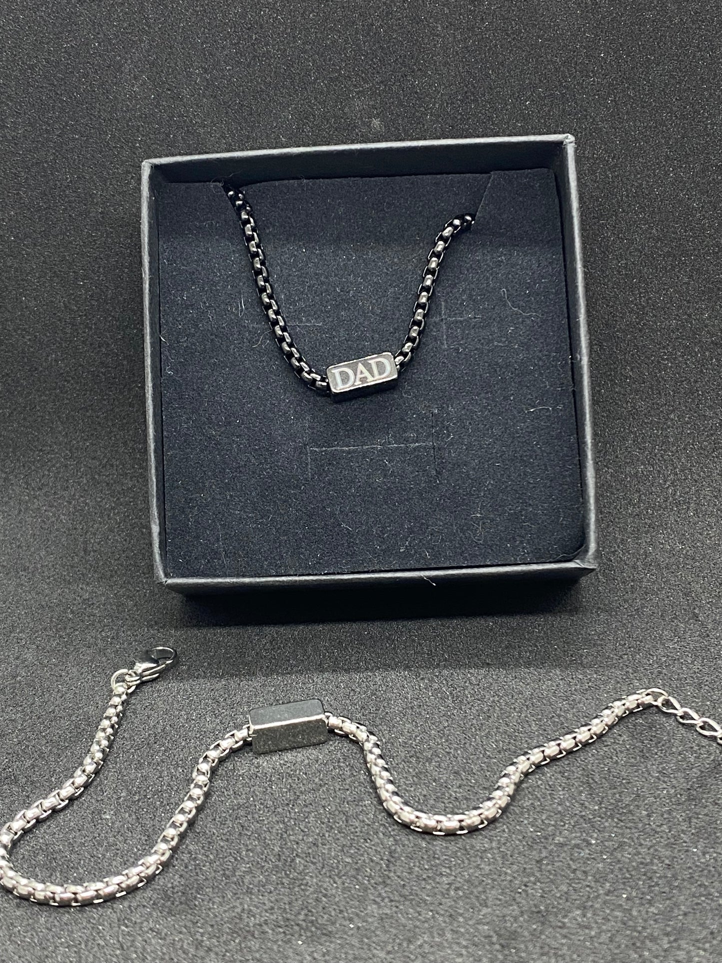 black bracelet in gift box and silver bracelet for Dad gift