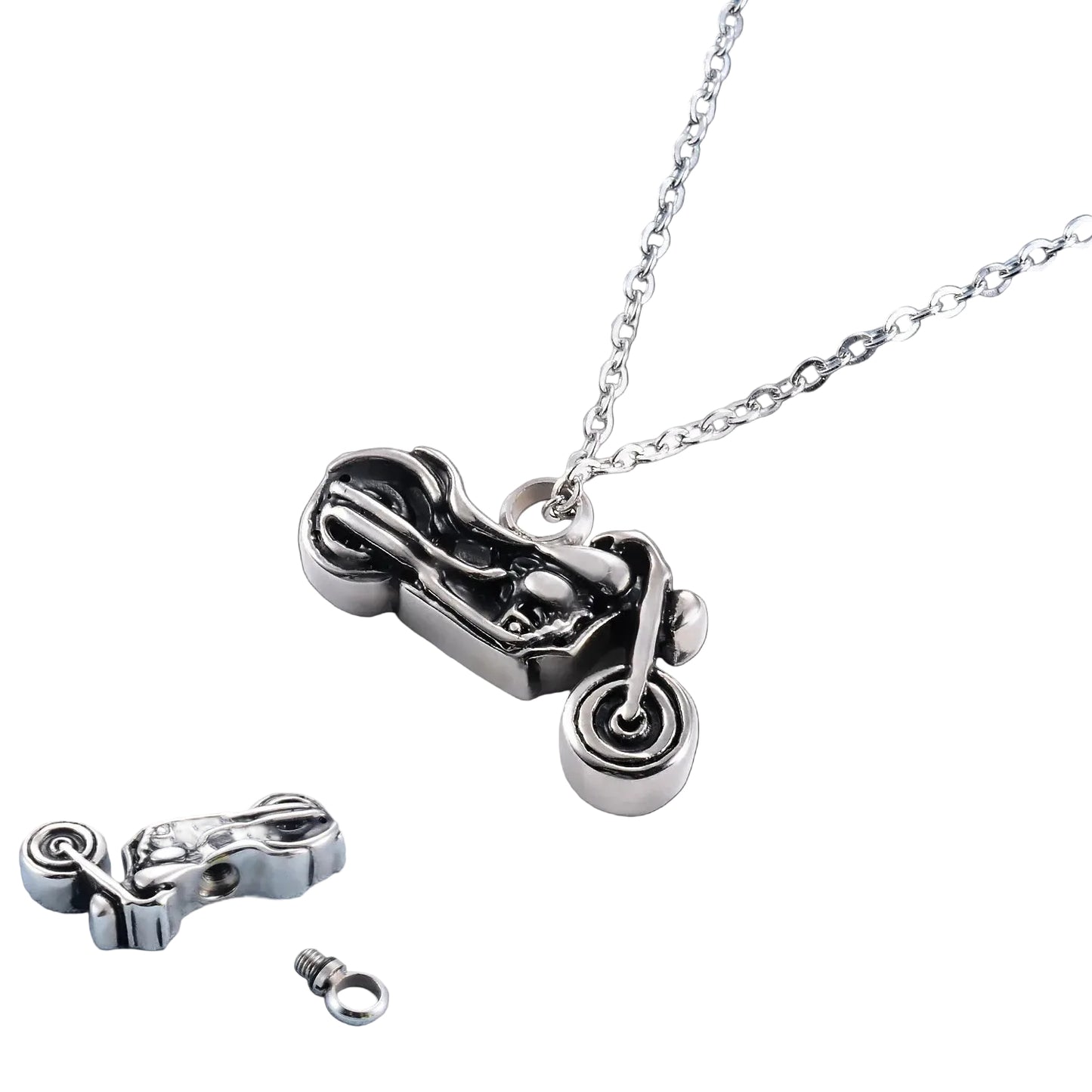 Motorcycle pendant necklace on a light blue fabric background