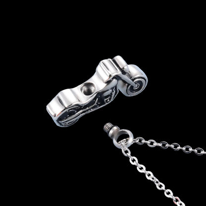 Silver necklace with a motorcycle urn pendant 