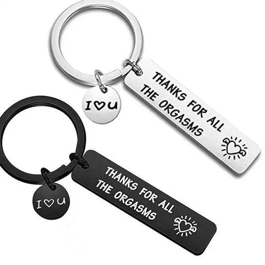 Two keychains with humorous text and heart designs on a white background
