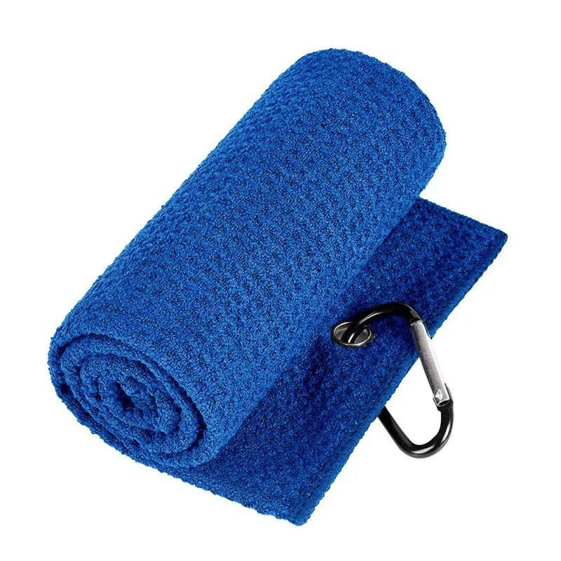 Blue towel with a carabiner clip on a white background