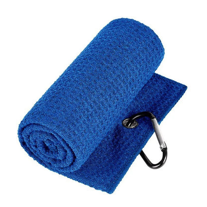 Blue towel with a carabiner clip on a white background