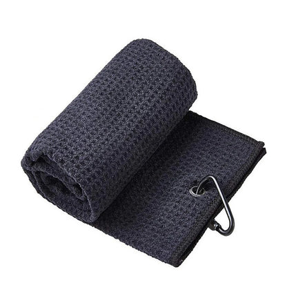 Dark gray textured towel with a metal clip on a white background