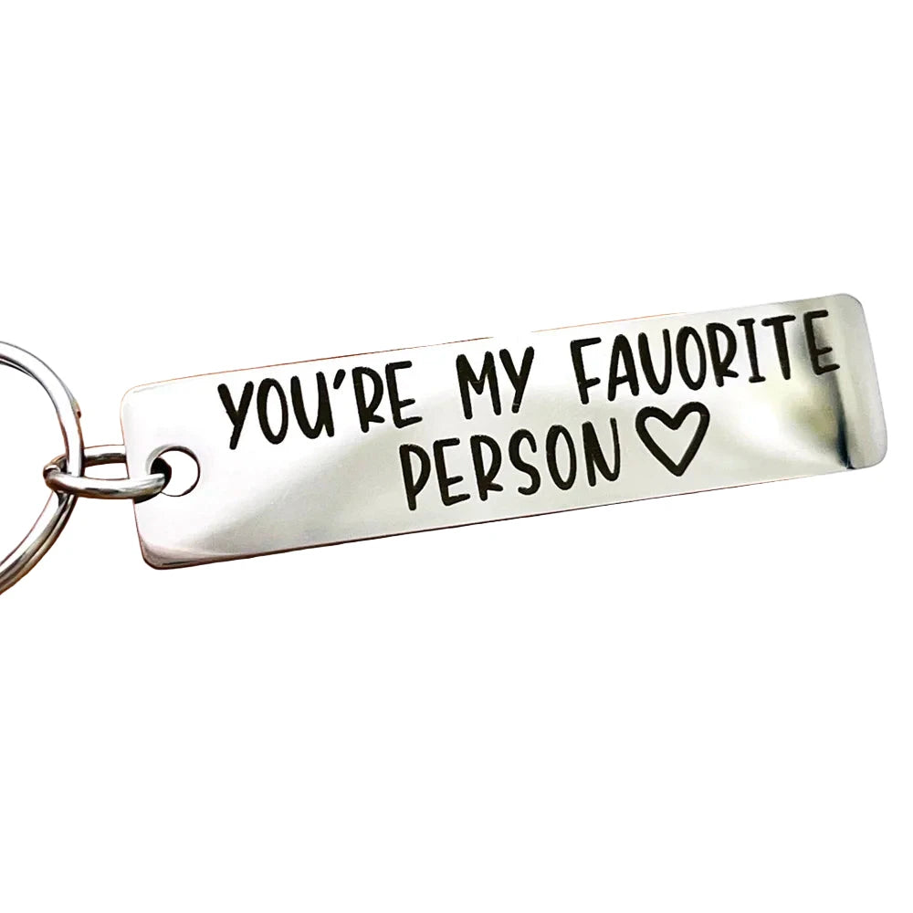 Silver keychain with 'You're My Favorite Person' text on a white background
