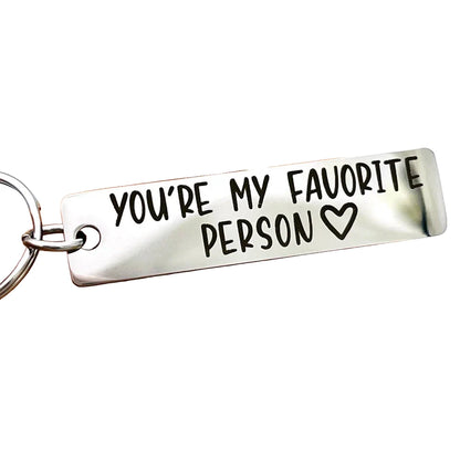 Silver keychain with 'You're My Favorite Person' text on a white background