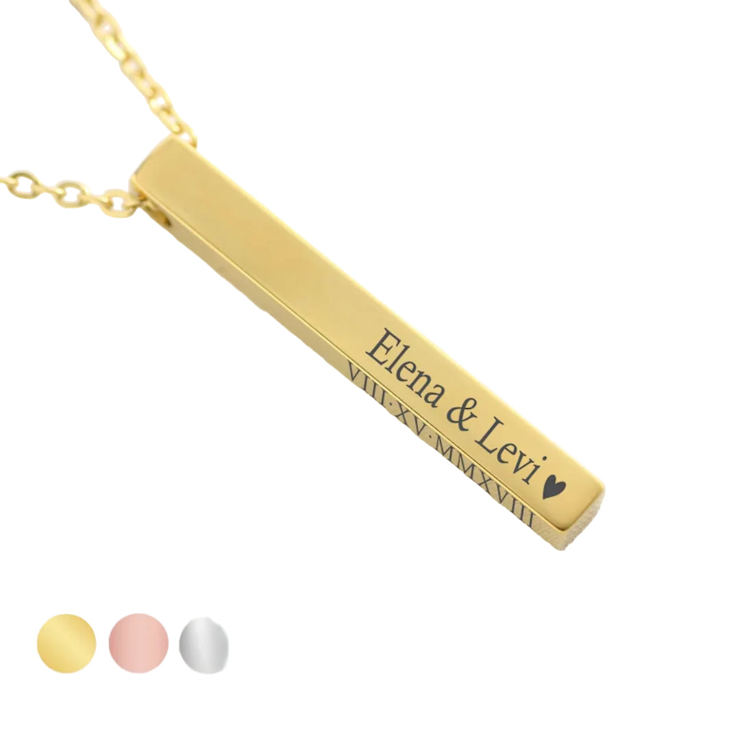 Gold bar necklace with engraved names on a light background