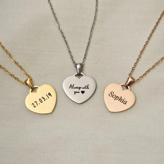 custom engraved heart charm necklaces in gold , silver and rose gold plated stainless steel 