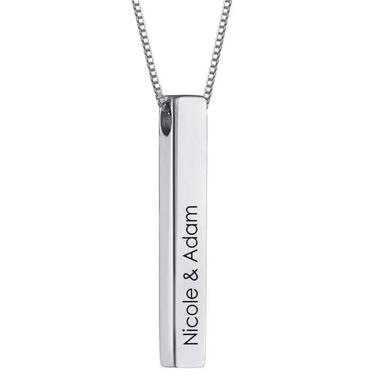 Silver necklace with a vertical bar pendant engraved with 'Nicole & Adam' on a white background.