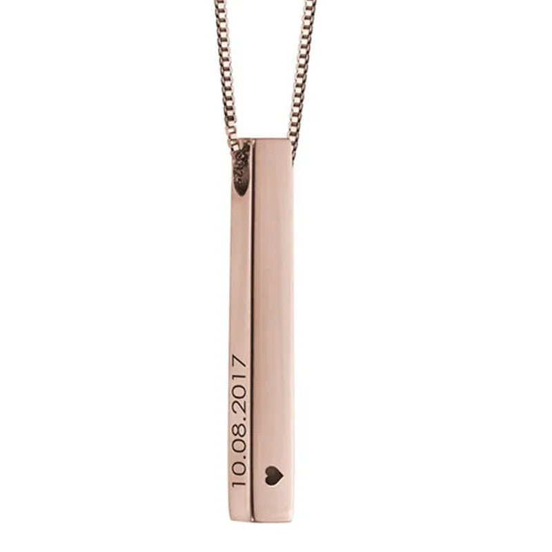 Rose gold necklace with a vertical bar pendant on a white background