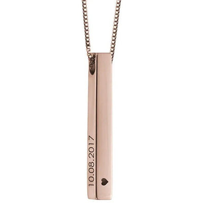 Rose gold necklace with a vertical bar pendant on a white background