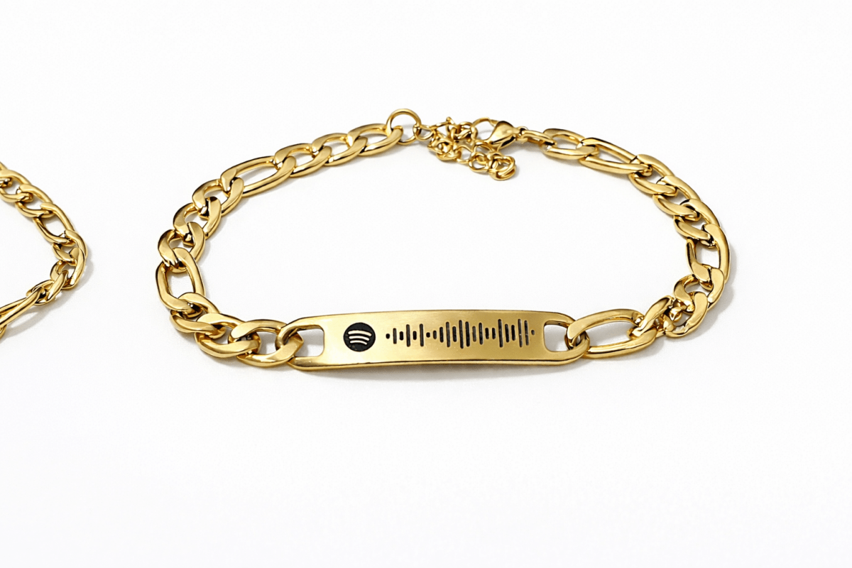 gold bracelet engraved with spotify code