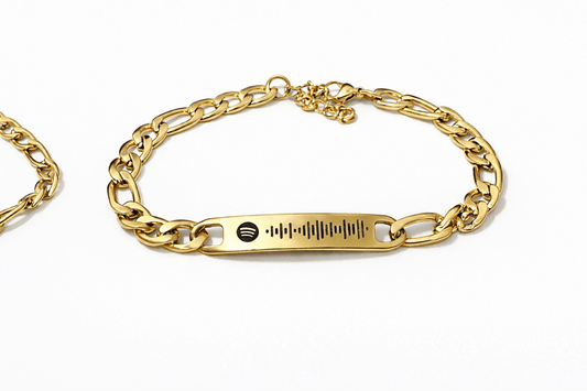 gold bracelet engraved with spotify code