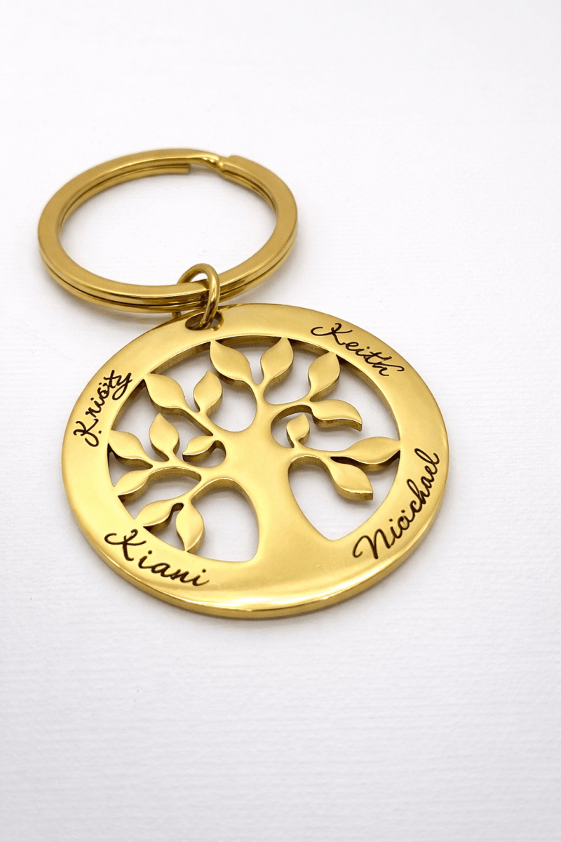Gold keychain with tree of life design and engraved names 