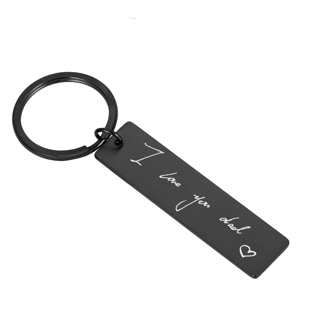 black small rectangle engraved message keyring